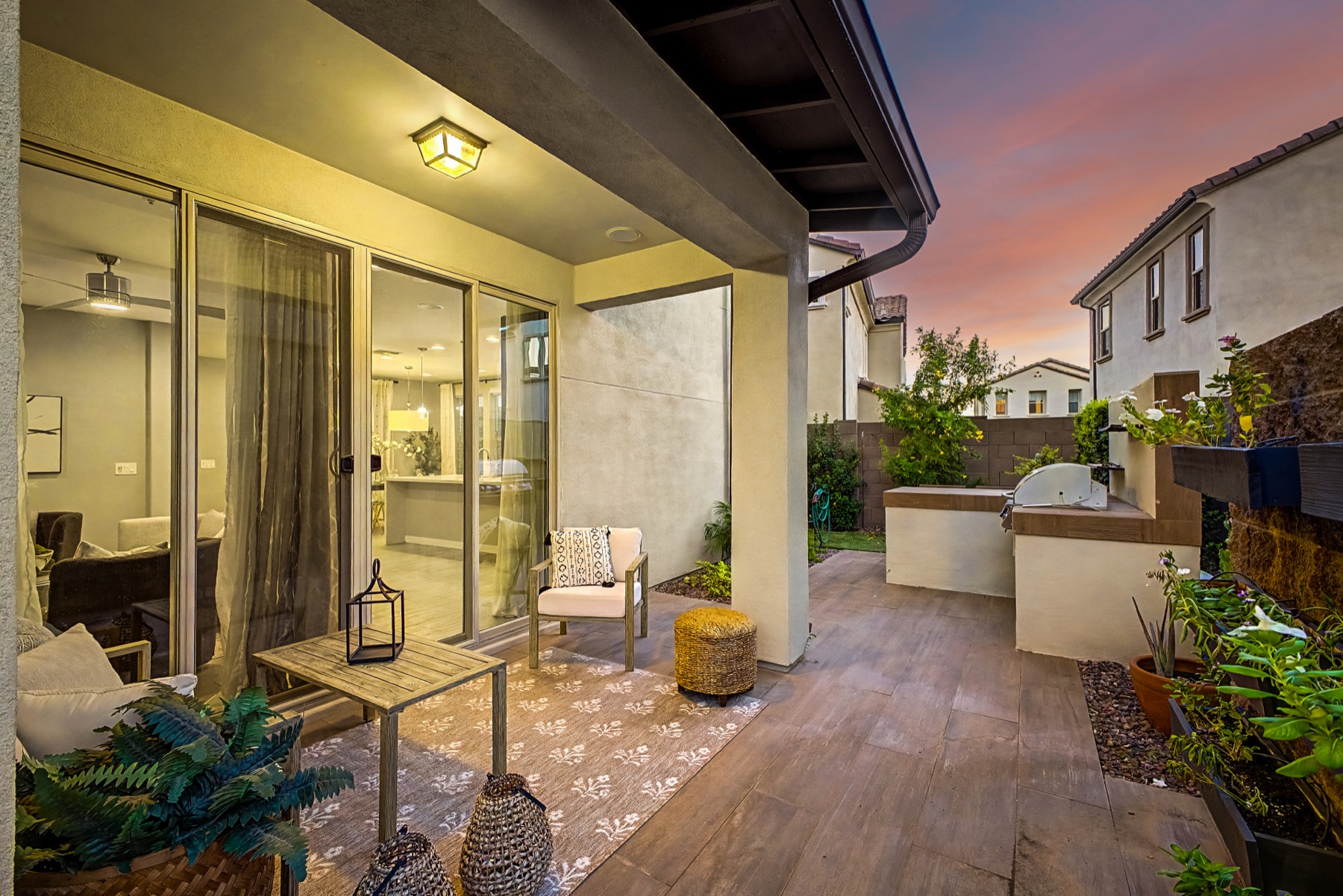Covered patio connected to the completed backyard